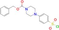 Benzyl 4-(4-(chlorosulfonyl)phenyl)piperazine-1-carboxylate