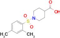 1-(2,4-Dimethylbenzenesulfonyl)piperidine-4-carboxylic acid