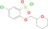 5-Chloro-2-(oxan-2-ylmethoxy)benzene-1-sulfonyl chloride