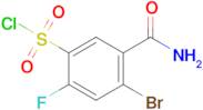 4-Bromo-5-carbamoyl-2-fluorobenzene-1-sulfonyl chloride