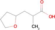 2-Methyl-3-(oxolan-2-yl)propanoic acid
