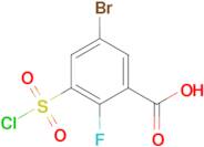 5-Bromo-3-(chlorosulfonyl)-2-fluorobenzoic acid