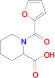 1-(Furan-2-carbonyl)piperidine-2-carboxylic acid