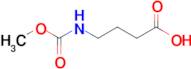 4-[(methoxycarbonyl)amino]butanoic acid