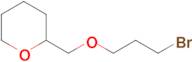 2-[(3-bromopropoxy)methyl]oxane