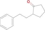 2-(2-Phenylethyl)cyclopentan-1-one
