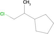 (1-Chloropropan-2-yl)cyclopentane