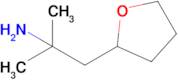 2-Methyl-1-(tetrahydrofuran-2-yl)propan-2-amine