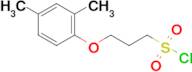 3-(2,4-Dimethylphenoxy)propane-1-sulfonyl chloride