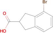 4-Bromo-2,3-dihydro-1H-indene-2-carboxylic acid