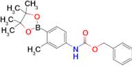 Benzyl (3-methyl-4-(4,4,5,5-tetramethyl-1,3,2-dioxaborolan-2-yl)phenyl)carbamate