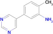 2-Methyl-5-(pyrimidin-5-yl)aniline