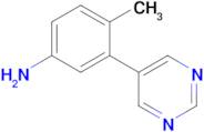 4-Methyl-3-(pyrimidin-5-yl)aniline