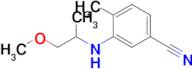 3-((1-Methoxypropan-2-yl)amino)-4-methylbenzonitrile