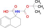 1-((Tert-butoxycarbonyl)amino)-1,2,3,4-tetrahydronaphthalene-1-carboxylic acid