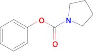 Phenyl pyrrolidine-1-carboxylate