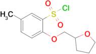 5-Methyl-2-((tetrahydrofuran-2-yl)methoxy)benzenesulfonyl chloride