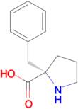 (S)-2-benzylpyrrolidine-2-carboxylic acid