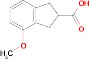 4-Methoxy-2,3-dihydro-1H-indene-2-carboxylic acid