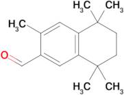 3,5,5,8,8-Pentamethyl-5,6,7,8-tetrahydronaphthalene-2-carbaldehyde