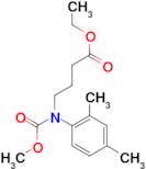 Ethyl 4-((2,4-dimethylphenyl)(methoxycarbonyl)amino)butanoate