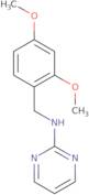 N-[(2,4-Dimethoxyphenyl)methyl]pyrimidin-2-amine