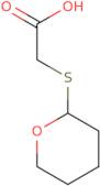 2-(Oxan-2-ylsulfanyl)acetic acid