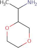 1-(1,4-Dioxan-2-yl)ethan-1-amine