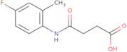 3-[(4-Fluoro-2-methylphenyl)carbamoyl]propanoic acid