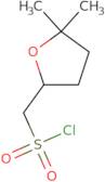(5,5-Dimethyloxolan-2-yl)methanesulfonyl chloride