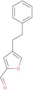 4-(2-Phenylethyl)furan-2-carbaldehyde