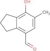 7-Hydroxy-6-methyl-2,3-dihydro-1H-indene-4-carbaldehyde