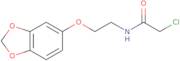 N-[2-(1,3-Dioxaindan-5-yloxy)ethyl]-2-chloroacetamide