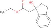 Ethyl 2-(1-hydroxy-2,3-dihydro-1H-inden-1-yl)acetate