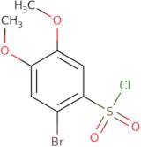 2-Bromo-4,5-dimethoxybenzene-1-sulfonyl chloride
