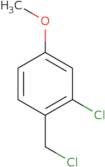 2-Chloro-1-(chloromethyl)-4-methoxybenzene