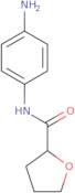 N-(4-Aminophenyl)oxolane-2-carboxamide