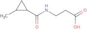 3-[(2-Methylcyclopropyl)formamido]propanoic acid