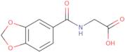 2-(1,3-Dioxaindan-5-ylformamido)acetic acid