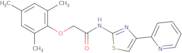 N-[4-(Pyridin-2-yl)-1,3-thiazol-2-yl]-2-(2,4,6-trimethylphenoxy)acetamide