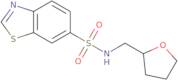 N-(Tetrahydrofuran-2-ylmethyl)-1,3-benzothiazole-6-sulfonamide