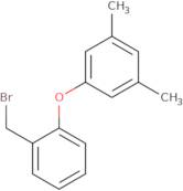 1-[2-(Bromomethyl)phenoxy]-3,5-dimethylbenzene