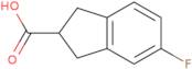 5-Fluoro-2,3-dihydro-1H-indene-2-carboxylic acid