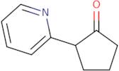 2-(Pyridin-2-yl)cyclopentan-1-one