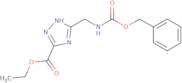 Ethyl 3-({[(benzyloxy)carbonyl]amino}methyl)-1H-1,2,4-triazole-5-carboxylate