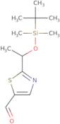 2-{1-[(tert-Butyldimethylsilyl)oxy]ethyl}-1,3-thiazole-5-carbaldehyde