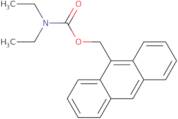 Anthracen-9-ylmethyl diethylcarbamate