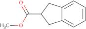 2-Methoxycarbonyl-indane