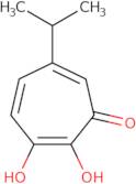 2,3-Dihydroxy-5-(1-methylethyl)-2,4,6-cycloheptatrien-1-one