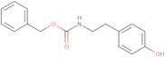 Benzyl N-[2-(4-hydroxyphenyl)ethyl]carbamate